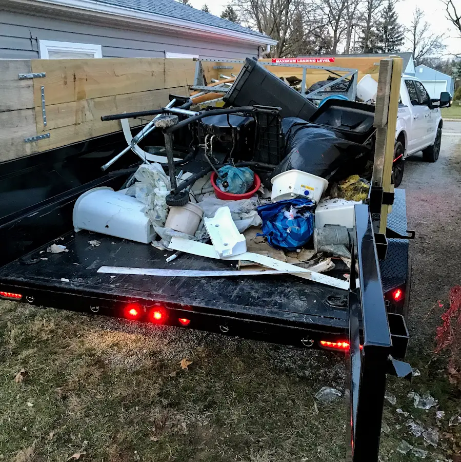 Roll-off dumpster delivered to a residential driveway in Marlton